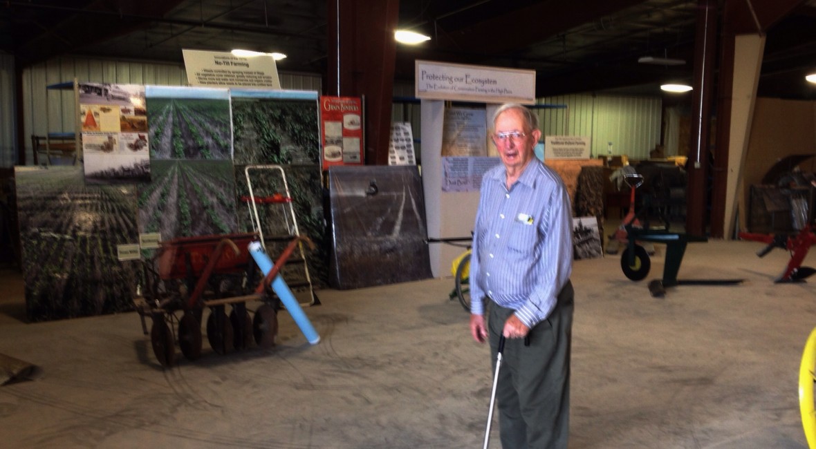 Charlie with an in-progress museum exhibit featuring his research in dryland agricultural techniques, 2014.
